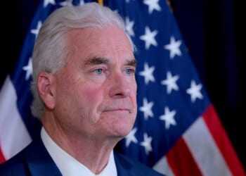 House Majority Whip Tom Emmer listens during a news conference on Capitol Hill on Dec. 2, 2025, in Washington, D.C.