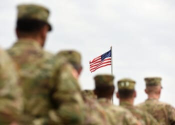 US Troops with an American Flag