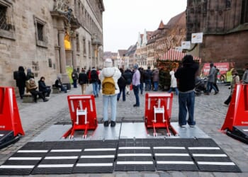 Mobile vehicle mitigation barriers are seen near the Christmas market prior to its official opening in Nuremberg, Germany, on Nov. 28, 2025.