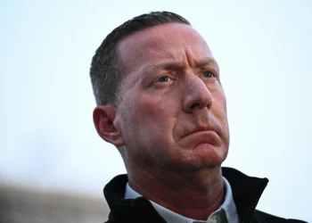 US Secret Service Director Sean Curran looks on during a press conference after a shooting in downtown Washington, DC, on November 26, 2025. On November 26, FBI Director Kash Patel told reporters two National Guard troops shot blocks away from the White House in downtown Washington were critically wounded, clarifying earlier erroneous reports that they had died. (Photo by Drew ANGERER / AFP via Getty Images)
