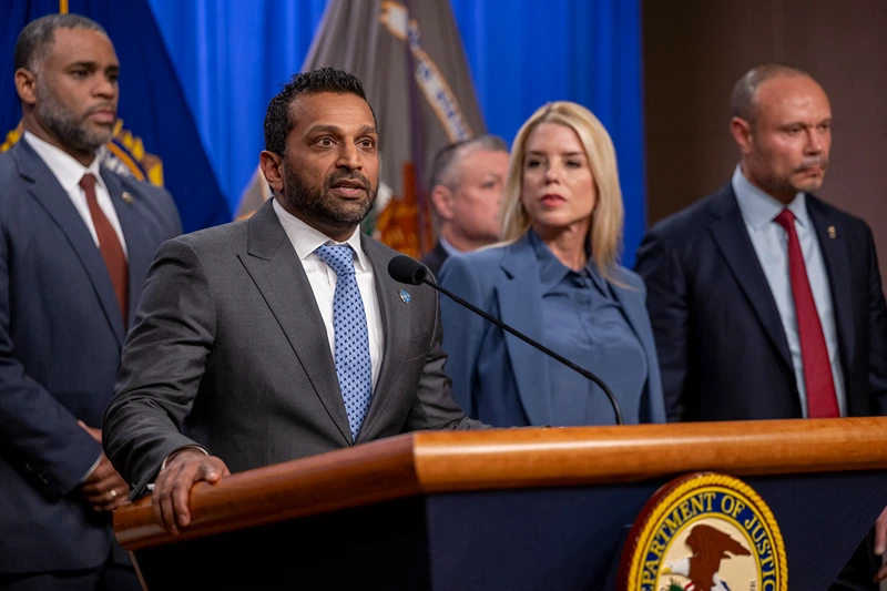 FBI Director Kash Patel (2L) speaks alongside Attorney General Pam Bondi (C) and Deputy FBI Director Dan Bongino (R) during a news conference at the Department of Justice to discuss the arrest of man in connection with pipe bombs placed near the Democratic and Republican party headquarters on the eve of the January 6, 2021 US Capitol riot, in Washington, DC, on December 4, 2025. (Photo by DANIEL HEUER / AFP via Getty Images)