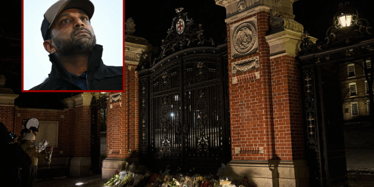 (Background) Brown University students and community members take a moment at a makeshift memorial for the victims of a December 13 mass shooting at the Van Winkle Gates outside Brown