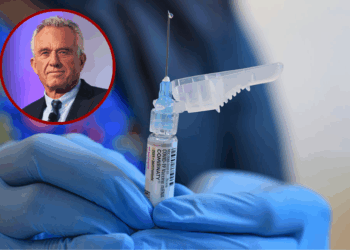 (L)Democratic Presidential Candidate Robert F. Kennedy Jr. listens as he is introduced by Rabbi Shmuley Boteach during the World Values Network