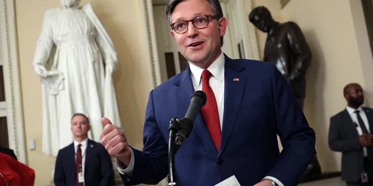 WASHINGTON, DC - DECEMBER 17: U.S. Speaker of the House Mike Johnson (R-LA) speaks to members of the media as he leaves the House Chamber at the U.S. Capitol on December 17, 2025 in Washington, DC. Four Republican Representatives join Democrats to sign a petition forcing a vote on legislation that will extend premium tax credits for the Affordable Care Act. (Photo by Kevin Dietsch/Getty Images)