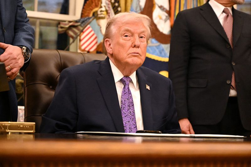 US President Donald Trump looks on during a signing ceremony on AI the Oval Office of the White House in Washington, DC, on December 11, 2025. (Photo by Alex WROBLEWSKI / AFP via Getty Images)