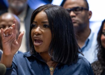 Rep. Jasmine Crockett (D-TX) speaks to reporters at a news conference in Warrenville, Illinois, on Aug. 4, 2025.