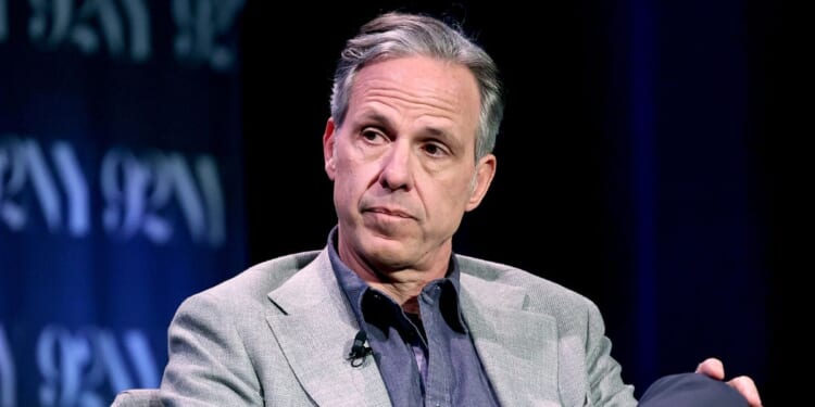 CNN anchor Jake Tapper sits on stage at an event in New York City on May 27, 2025.
