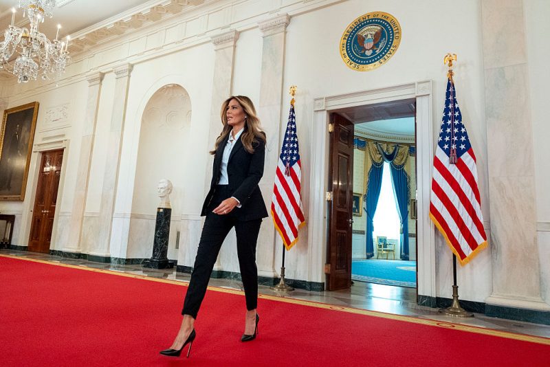 WASHINGTON, DC - OCTOBER 10: First lady Melania Trump arrives before delivering a statement in the Grand Foyer at the White House on October 10, 2025 in Washington, DC. The first lady announced she and Russian President Vladimir Putin have an "open channel of communication" to help reunite Ukrainian children displaced by the Russian-Ukraine war with their families. (Photo by Alex Brandon - Pool/Getty Images)