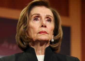 Speaker Emerita Nancy Pelosi listens to House Minority Leader Hakeem Jeffries speak at the U.S. Capitol on Nov. 20, 2025, in Washington, D.C.