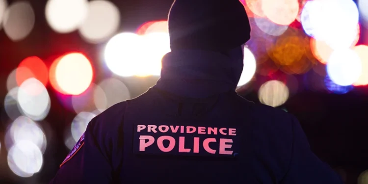 PROVIDENCE, RHODE ISLAND - DECEMBER 13: Police officers remain on the scene on Brown University