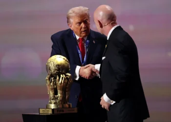WASHINGTON, DC - DECEMBER 05: U.S. President Donald Trump receives the FIFA Peace Prize from Gianni Infantino, President of FIFA, during the FIFA World Cup 2026 Official Draw at John F. Kennedy Center for the Performing Arts on December 05, 2025 in Washington, DC. (Photo by Patrick Smith/Getty Images)