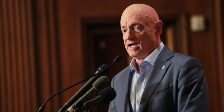 Sen. Mark Kelly, a Democrat from Arizona, speaks at a news conference in the U.S. Capitol on Dec. 1, 2025, in Washington, D.C.