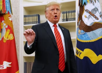 President Donald Trump gives pauses to answer a reporters' question about a whistleblower as he leaves the Oval Office after hosting the ceremonial swearing in of Labor Secretary Eugene Scalia at the White House on Sept. 30, 2019, in Washington, D.C.