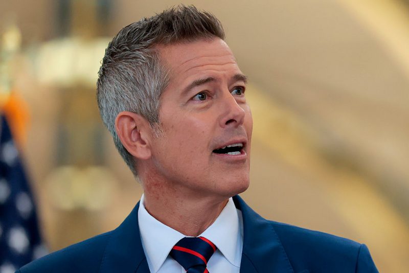 ARLINGTON, VA - DECEMBER 08: U.S. Transportation Secretary Sean P. Duffy speaks alongside Human Services Secretary Robert F. Kennedy Jr. at a conference discussing the launch of the "Make Travel Family Friendly Again" campaign at Ronald Reagan Washington National Airport on December 08, 2025 in Arlington, Virginia. The campaign's focus is to incentivize family-friendly resources at airports. (Photo by Heather Diehl/Getty Images)