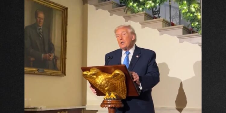 President Donald Trump paused to pay tribute to the National Guard members shot last week.