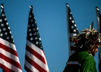 LUMBERTON, NC - OCTOBER 24: People attend a campaign rally for President Donald Trump on October 24, 2020 in Lumberton, North Carolina. President Trump has expressed his support for the Lumbee Indian people to be recognized on a federal level. President Trump continues to campaign against Democratic presidential nominee Joe Biden leading up to the November 3rd Election Day. (Photo by Melissa Sue Gerrits/Getty Images)