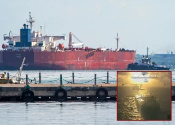 (background) A crude oil tanker is anchored on Lake Maracaibo near Maracaibo, Zulia state, Venezuela, on December 18, 2025. (Alejandro Paredes / AFP via Getty Images) / (R) footage of the declassified Saturday operation by the U.S. Coast Guard released by DHS Secretary Kristi Noem