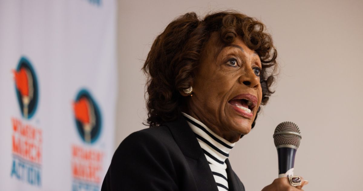 Rep. Maxine Waters speaks to a crowd of volunteers before a phone banking event for Prop 50 at the Women's March Foundation Office on Oct. 23, 2025, in Los Angeles, California.