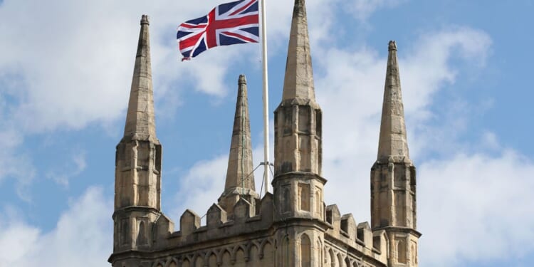 Why was a teacher sacked for calling Britain a Christian country?