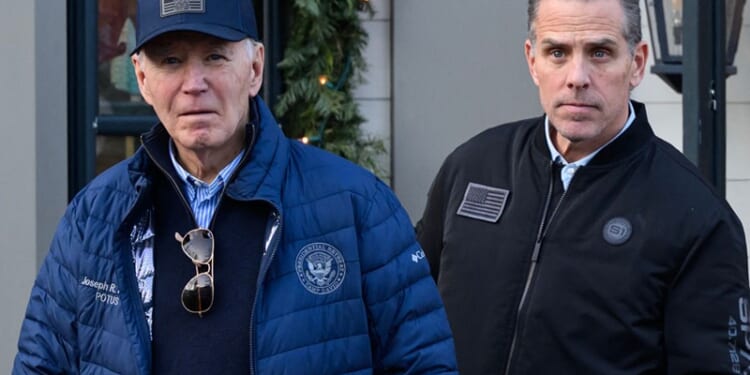 A November 29, 2024 photo shows US President Joe Biden and son Hunter Biden stepping out of a bookstore while shopping in Nantucket, Massachusetts on November 29, 2024. Biden on Sunday issued an official pardon for his son Hunter, who is facing sentencing for two criminal cases related to tax evasion and the purchase of a firearm. (Photo by Mandel NGAN / AFP) (Photo by MANDEL NGAN/AFP via Getty Images)