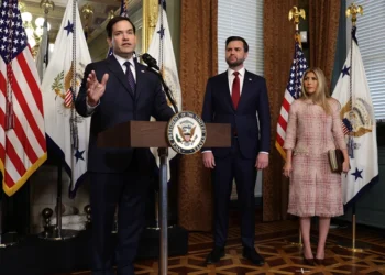 WASHINGTON, DC - JANUARY 21: Former U.S. Sen. Marco Rubio (R-FL) (L) speaks as Vice President J.D. Vance (2nd L) as his wife Jeanette Dousdebes Rubio (R) listen during a swearing in ceremony at the Vice President’s ceremonial office at Eisenhower Executive Office Building January 21, 2025 in Washington, DC. Rubio has been sworn in as the 72nd U.S. Secretary of State. (Photo by Alex Wong/Getty Images)
