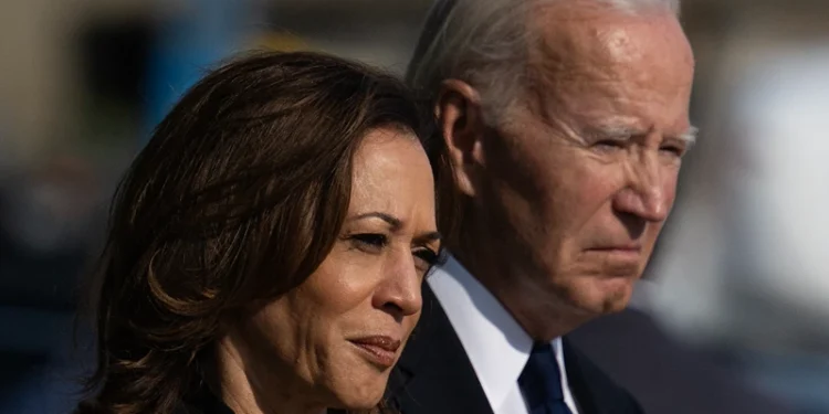 TOPSHOT - US Vice President and Democratic presidential candidate Kamala Harris and US President Joe Biden attend a wreath-laying ceremony at the Pentagon in Washington, DC, on September 11, 2024, on the 23rd anniversary of the 9/11 attacks. (Photo by Drew ANGERER / AFP) (Photo by DREW ANGERER/AFP via Getty Images