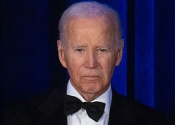 Former President Joe Biden, seen in a July photo, is raking in the largest pension of any U.S. president in history.