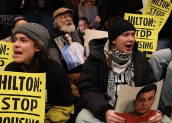 Immigration rights activists stage a sit-in at the Hilton Garden Inn on Jan. 27, 2026, in New York City.