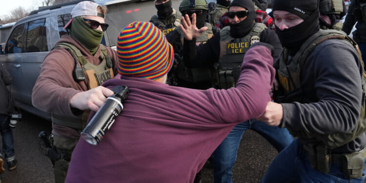 Clashes in Minneapolis as DHS Says Good Struck ICE Agent with Car, Causing Internal Bleeding