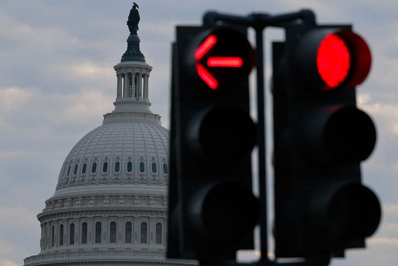 WASHINGTON, DC - JANUARY 05: Traffic lights point the way near the U.S. Capitol on January 05, 2026 in Washington, DC. Members of Congress are set to return to the capital Monday following a two-and-a-half week break for the holidays. (Photo by Chip Somodevilla/Getty Images)