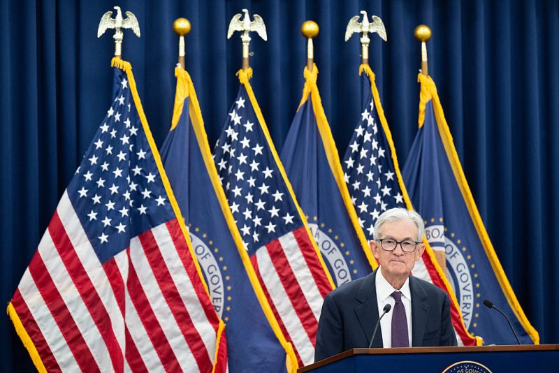 TOPSHOT - US Federal Reserve Chair Jerome Powell speaks during a press conference at the Federal Reserve Board Building in Washington, DC, on January 28, 2026. The US Federal Reserve held interest rates steady Wednesday at its first policy gathering this year, citing robust economic growth, as the central bank resists President Donald Trump's mounting pressure for cuts. (Photo by SAUL LOEB / AFP via Getty Images)