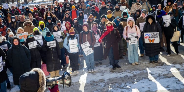 Students protest against ICE during a walkout at the University of Minnesota on Jan. 26, 2026, in Minneapolis, Minnesota.