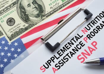 Supplemental Nutrition Assistance Program Clipboard and US Dollar