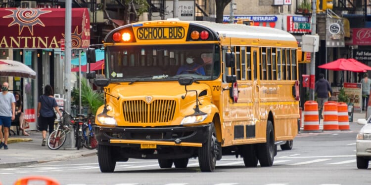 A school bus transports students through the New York and New Jersey areas on Aug. 17, 2020.