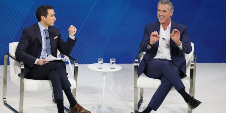 New York Times columnist Andrew Ross Sorkin and California Gov. Gavin Newsom during the 2025 New York Times Dealbook Summit at Jazz at Lincoln Center on Dec. 3, 2025, in New York City.