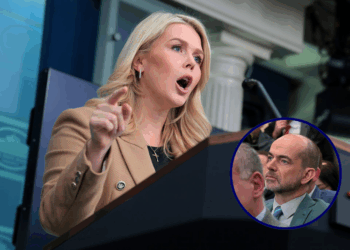 (Background) White House Press Secretary Karoline Leavitt speaks during a news briefing in the James S. Brady Press Briefing Room of the White House on January 15, 2026 in Washington, DC. Leavitt discussed mortgage rates, the Supreme Court case on transgender athletes participating in women’s sports and the Trump administration’s “Great Healthcare Plan,” among other topics. (Photo by Anna Moneymaker/Getty Images) / (R) Journalist Niall Stanage looks on during a news briefing in the James S. Brady Press Briefing Room of the White House on January 15, 2026 in Washington, DC. White House Press Secretary Karoline Leavitt discussed mortgage rates, the Supreme Court case on transgender athletes participating in women’s sports and the Trump administration’s “Great Healthcare Plan,” among other topics. (Photo by Anna Moneymaker/Getty Images)