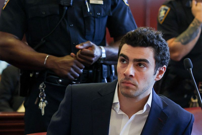 Luigi Mangione appears in Manhattan Supreme Court during an evidence suppression hearing in the murder case of United Healthcare CEO Brian Thompson, in New York, on December 18, 2025. (Photo by Shannon Stapleton / POOL / AFP via Getty Images)