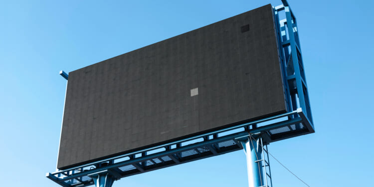 Man Paints Over Heretical Message on Massive Billboard in Los Angeles