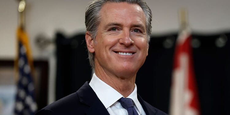 SAN FRANCISCO, CALIFORNIA - JANUARY 16: California Gov. Gavin Newsom looks on during a press conference at Friendship House Association of American Indians on January 16, 2026 in San Francisco, California. California Gov. Gavin Newsom joined San Francisco Mayor Daniel Lurie to announce new funding for homelessness and mental health efforts in the city of San Francisco. The governor announced more than $420 million in new state funding for San Francisco, Los Angeles, and San Diego as part of the state