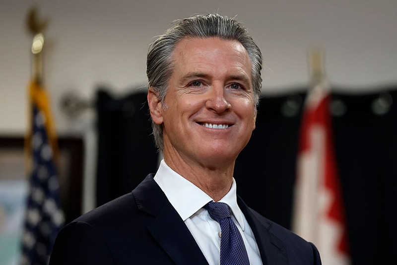 SAN FRANCISCO, CALIFORNIA - JANUARY 16: California Gov. Gavin Newsom looks on during a press conference at Friendship House Association of American Indians on January 16, 2026 in San Francisco, California. California Gov. Gavin Newsom joined San Francisco Mayor Daniel Lurie to announce new funding for homelessness and mental health efforts in the city of San Francisco. The governor announced more than $420 million in new state funding for San Francisco, Los Angeles, and San Diego as part of the state's HHAP 6 funding, which goes toward helping local programs end homelessness through interim or permanent housing and supportive services. (Photo by Justin Sullivan/Getty Images)