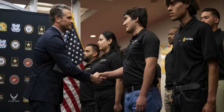 War Secretary Pete Hegseth greets recruits at a swearing-in ceremony at the Los Angeles Military Entrance Processing Station on January 9, 2026. (via: U.S. Department of War)