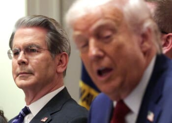 President Donald Trump speaks at a roundtable discussion with farmers in the Cabinet Room of the White House next to U.S. Treasury Secretary Scott Bessent.