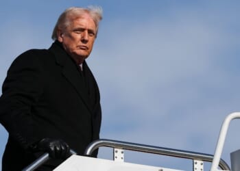 President Donald Trump boards Air Force One at Joint Base Andrews, Maryland, on Jan. 27, 2026.