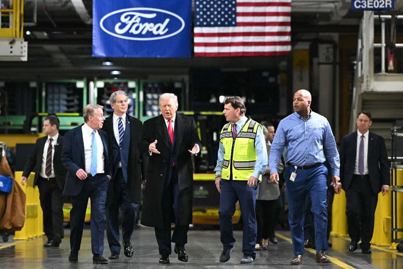 US President Donald Trump, alongside L/R Ford executive chairman Bill Ford, Secretary of Treasury Scott Bessent, Ford CEO Jim Farley, and plant manager Corey Williams, tours Ford Motor Company's River Rouge complex in Dearborn, Michigan on January 13, 2026. (Photo by Mandel NGAN / AFP via Getty Images)