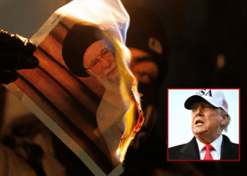 (Background) A protester burns an image of Ali Khamenei, Supreme Leader of Iran during a protest outside the Iranian Embassy on January 14, 2026 in London, England. On Tuesday Foreign Secretary Yvette Cooper announced "full and further sanctions" against Iran in reaction to the regime
