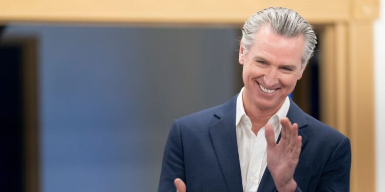 California Gov. Gavin Newsom applauds during an event hosted by the South Carolina Democratic Party at the Carter-Sullivan American Legion on Feb. 23, 2026, in Manning, South Carolina.