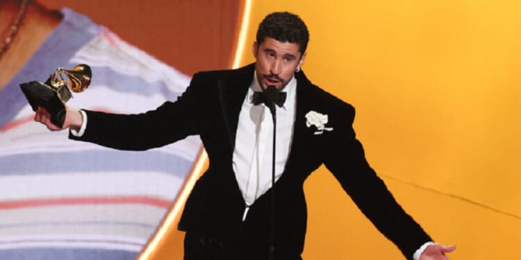 The Puerto Rican singer known as Bad Bunny accepts the award for Album of the Year for "Debi Tirar Mas Fotos" on stage Sunday during the 68th Annual Grammy Awards at the Crypto.com Arena in Los Angeles.