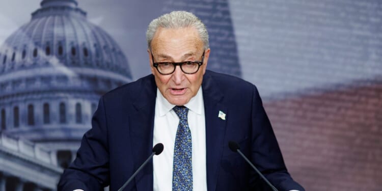 Senate Minority Leader Chuck Schumer speaks to reporters following the passage of a spending bill, on Jan. 30, 2026, in Washington, D.C.
