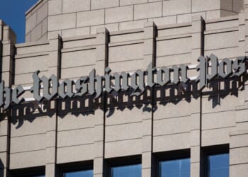 The logo of The Washington Post is displayed on the top of the organization's editorial headquarters in Washington, DC on May 26, 2025.