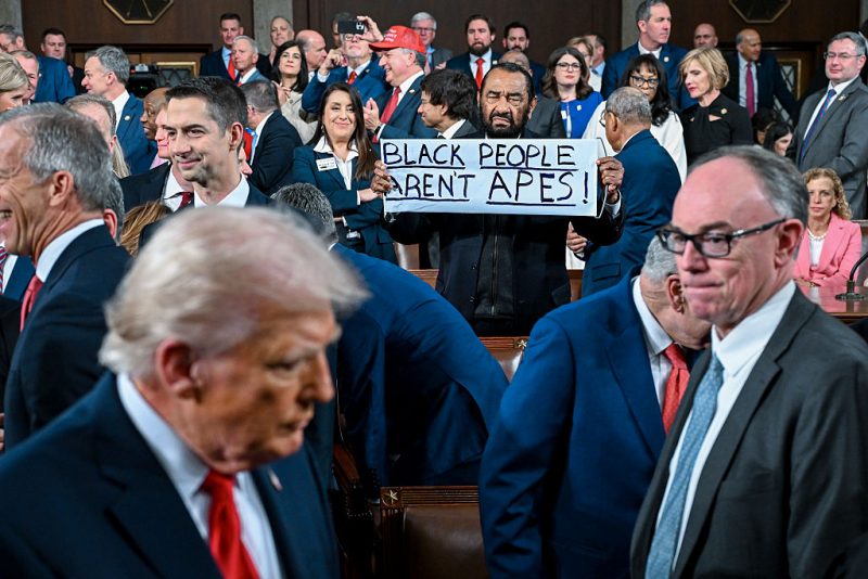 WASHINGTON, DC - FEBRUARY 24: U.S. Rep. Al Green (D-TX) protests as President Donald Trump arrives to deliver the State of the Union address during a joint session of Congress at the Capitol on February 24, 2026 in Washington, DC. Trump delivered his address days after the Supreme Court struck down the administration's tariff strategy, and amid a U.S. military buildup in the Persian Gulf threatening Iran. (Photo by Kenny Holston-Pool/Getty Images)